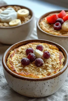 Baked protein pancake bowls topped with fresh fruits and nuts