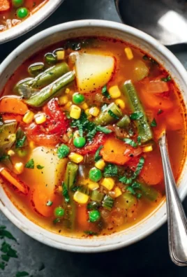 Easy homemade vegetable soup loaded with fresh vegetables and herbs