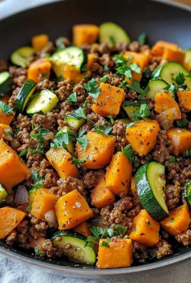 Ground beef zucchini sweet potato skillet dish on a plate