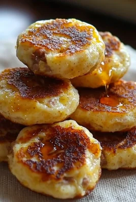 Delicious McGriddle Bites perfect for breakfast, featuring sweet syrup and savory sausage.