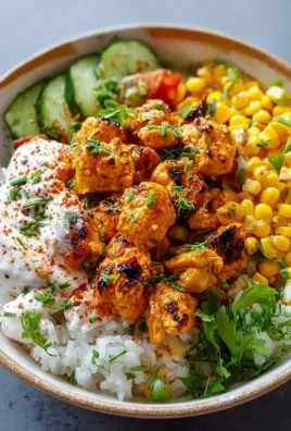 Delicious Street Corn Chicken Rice Bowl topped with fresh ingredients.