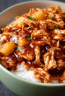 Sweet Hawaiian Crockpot Chicken in a slow cooker with colorful ingredients