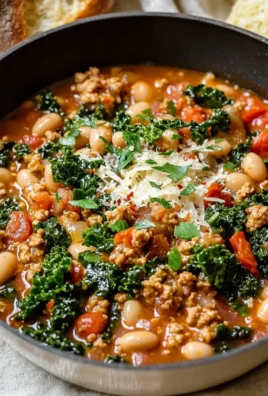 Delicious Tuscan Turkey and White Bean Skillet served in a pan.