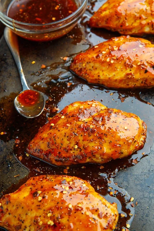Delicious baked firecracker chicken served with vibrant vegetables
