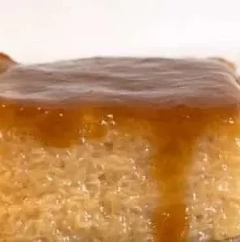 Biko, a delightful Filipino rice cake topped with coconut and sugar