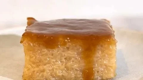 Biko, a delightful Filipino rice cake topped with coconut and sugar
