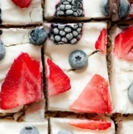 Frozen yogurt granola bars stacked on a plate, showcasing their creamy and crunchy texture.