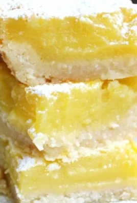 Delicious homemade lemon bars with a bright lemon filling and a buttery crust.