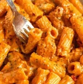 Delicious Marry Me Chicken Pasta with creamy sauce and herbs