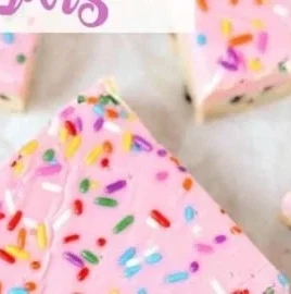 Delicious no bake cookie dough bars cut into squares on a plate