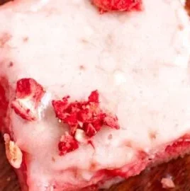 Fudgy strawberry brownies made with cake mix topped with fresh strawberries