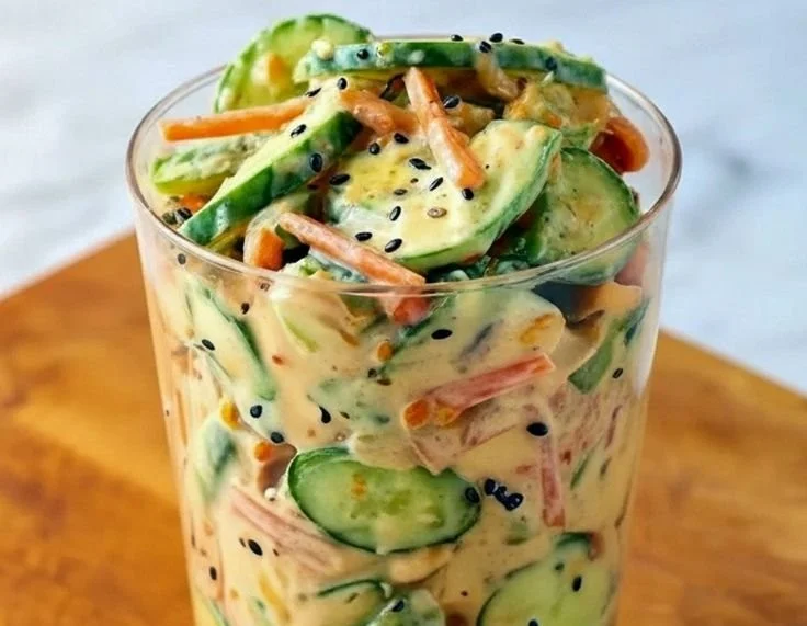 Viral creamy Asian cucumber salad featuring fresh cucumbers and a delicious creamy dressing