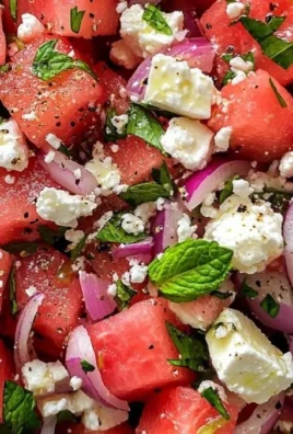 Refreshing Watermelon Feta Salad with Mint served in a bowl