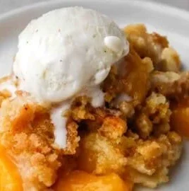 Delicious 3-Ingredient Cake Mix Peach Cobbler fresh from the oven.