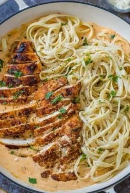 Delicious Cajun Chicken Pasta with vegetables and a creamy sauce