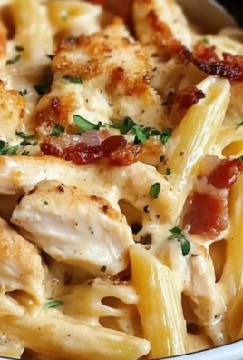 Delicious Chicken Penne pasta served with creamy sauce and herbs