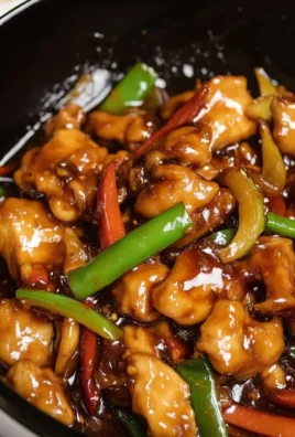 Delicious plate of chicken with garlic sauce garnished with herbs