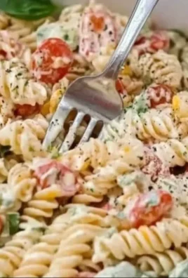 Creamy Italian pasta salad with colorful vegetables and dressing