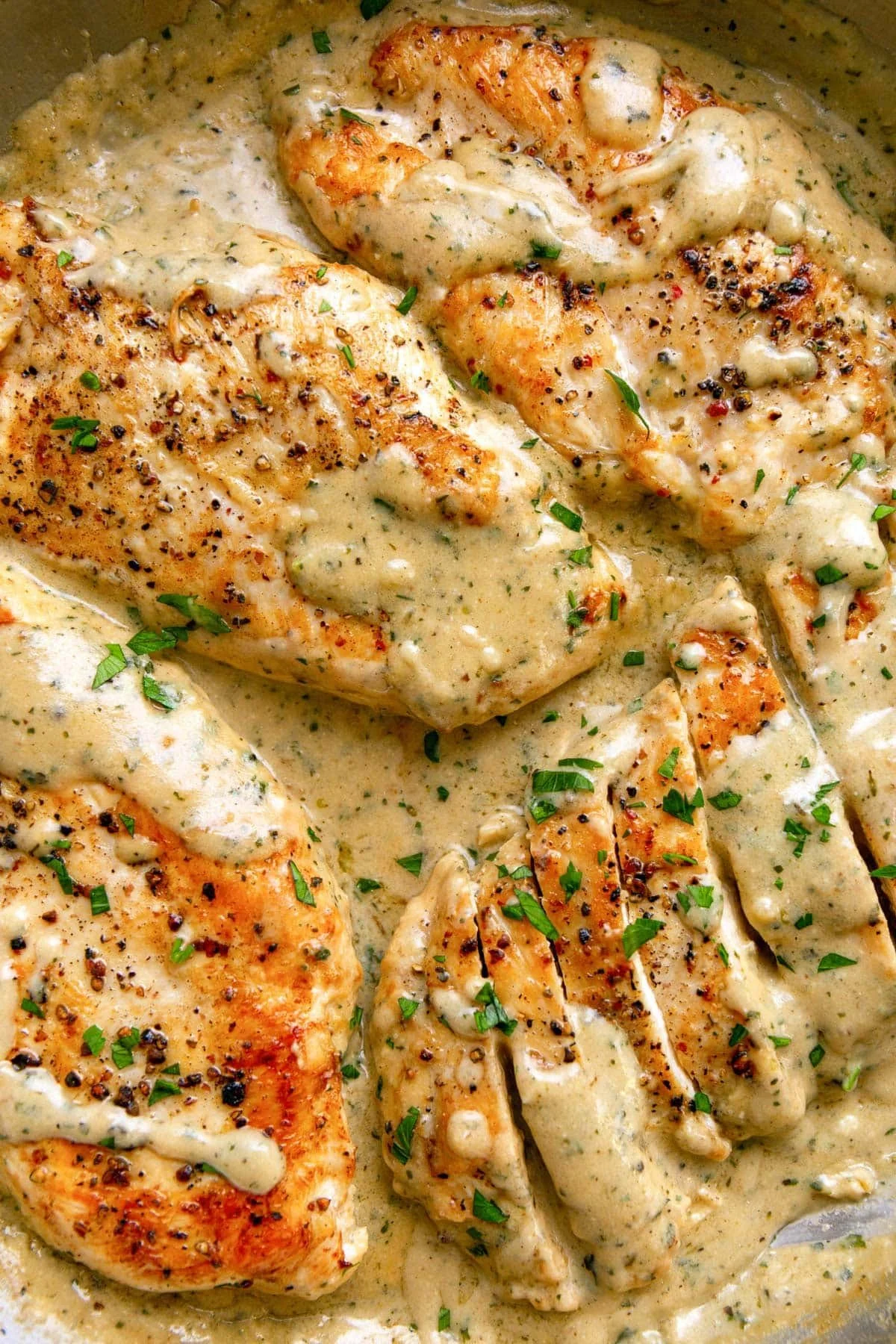 Creamy Ranch Chicken dish garnished with herbs on a plate
