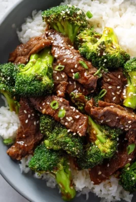 Delicious Crockpot Beef and Broccoli served with rice