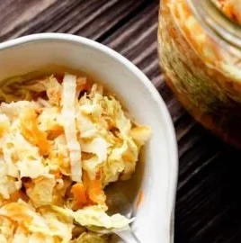 Bowl of easy pickled cabbage recipe with fresh ingredients and spices