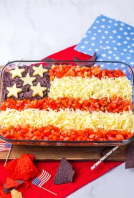 Festive Flag Taco Dip arranged in a colorful layer for parties
