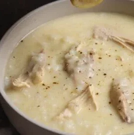 Bowl of Greek Avgolemono Soup, a flavorful egg-lemon chicken soup