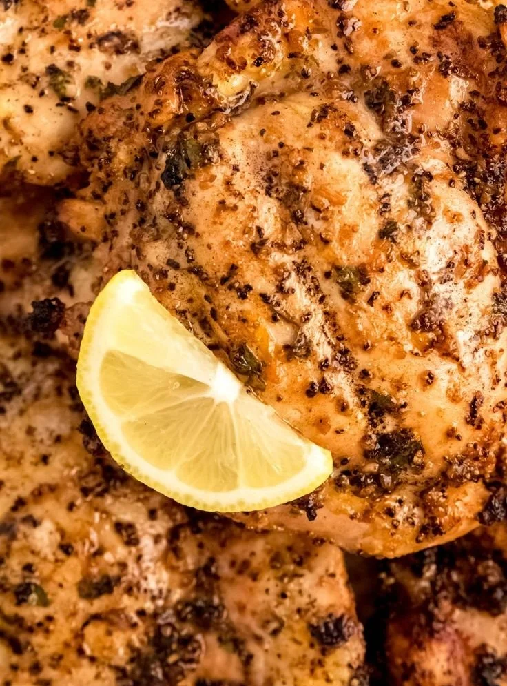 Marinated lemon pepper chicken ready to be grilled or baked.