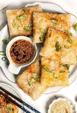 Rice paper dumplings filled with cabbage and tofu on a plate