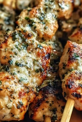 Garlic parmesan chicken skewers grilled to perfection for a summer barbecue