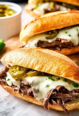 Slow Cooker Mississippi Pot Roast Sandwiches with tender beef and spices