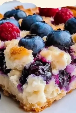 Blueberry cottage cheese breakfast bake served in a dish with fresh blueberries