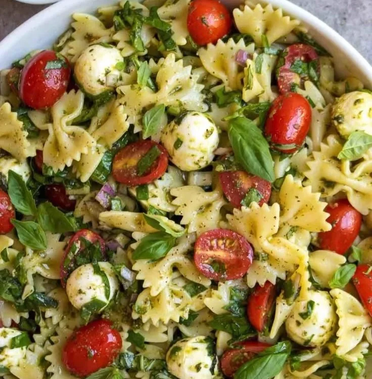 Bow Tie Pasta Salad with fresh vegetables and dressing