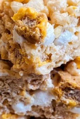 Delicious Butterfinger Krispie Treats ready to be served