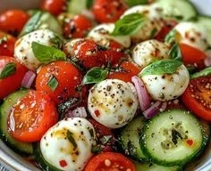 Delicious Cucumber Caprese Salad with tomatoes and mozzarella cheese