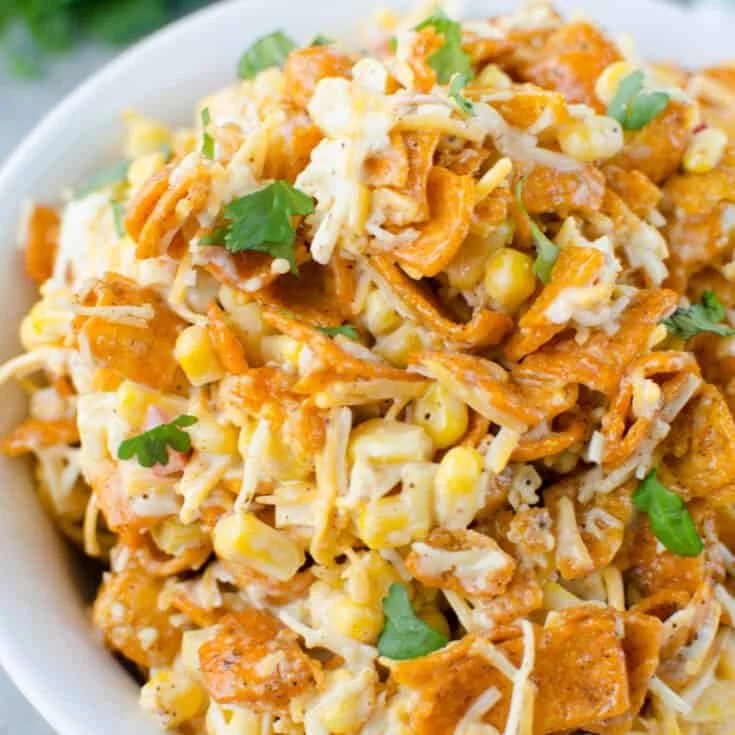 Delicious Fritos Corn Salad served in a bowl, perfect for summer gatherings.