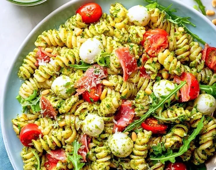 Italian Antipasto Pesto Pasta Salad with vibrant veggies and pesto dressing