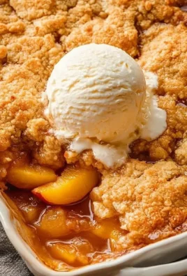 Delicious peach cobbler recipe by Joanna Gaines with fresh peaches and crust