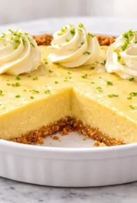 Delicious slice of homemade key lime pie with whipped cream topping