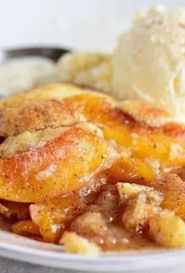 Delicious homemade Peach Cobbler with a golden crust and fresh peaches